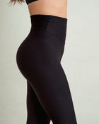 Legging levanta glúteos que moldea los glúteos y afina el abdomen y la cintura