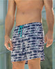 Pantaloneta de baño estampada de silueta ancha#color_548-estampado-palmeras
